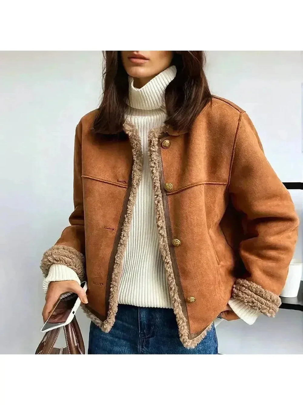 Women's brown jacket with textured trim, round neckline and button front