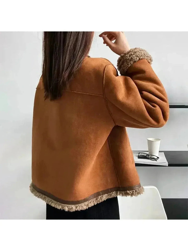 Women's brown jacket with textured trim, round neckline and button front