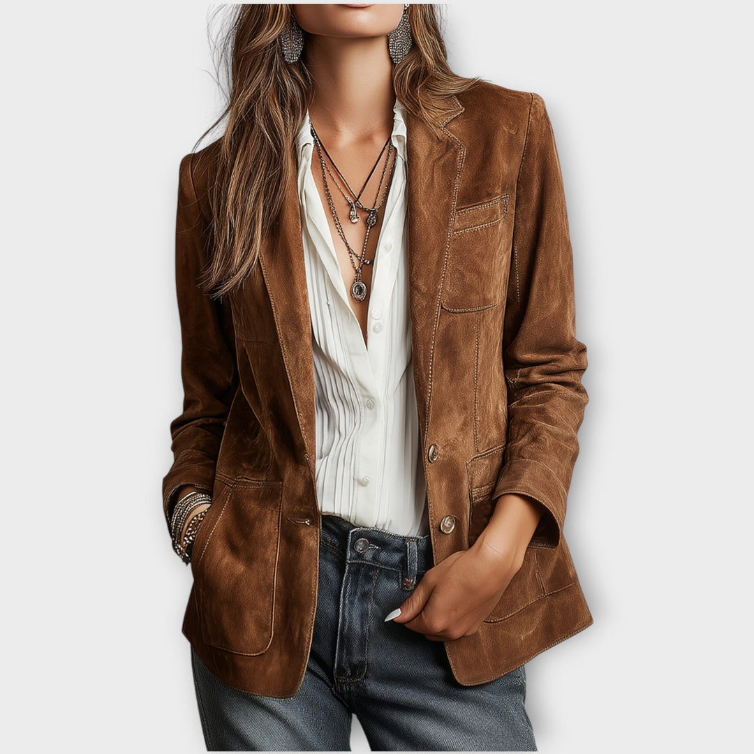 Women's vintage brown blazer with notched lapels, long sleeves, buttons and multiple pockets