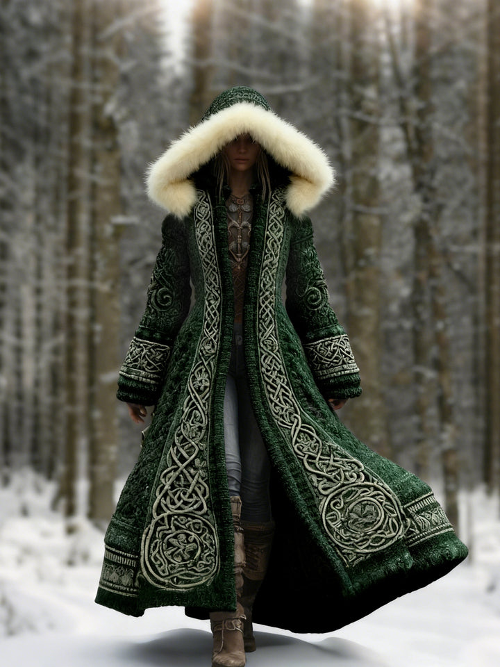 Women's hooded longline coat with ornate embroidery and pale hood trim