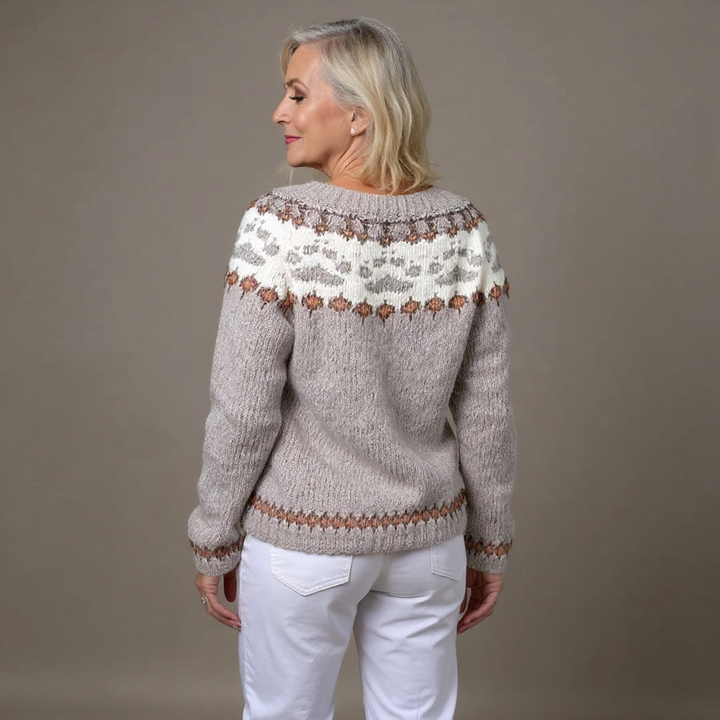 Women's light gray cardigan with multicolor patterned bands and brown buttons