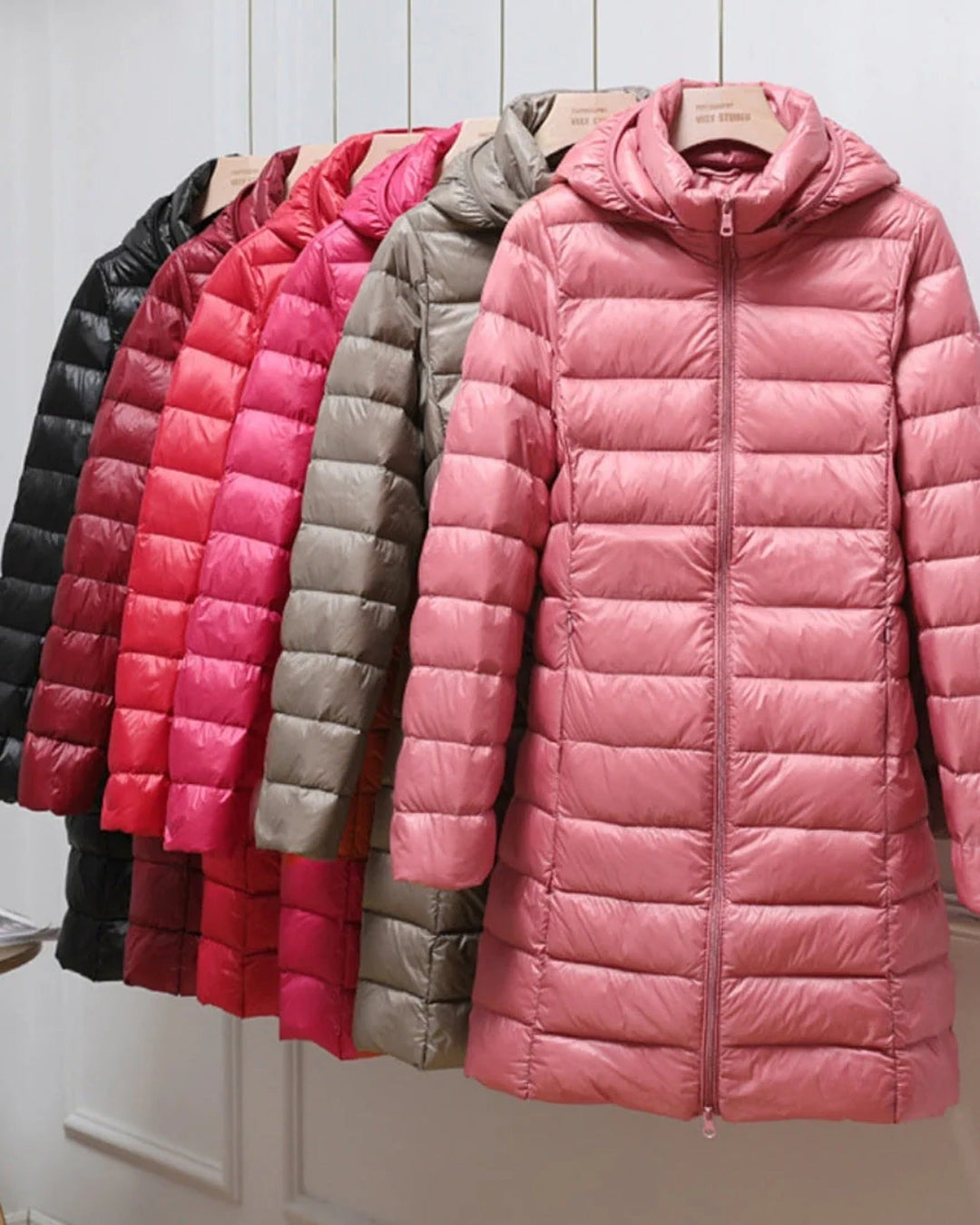 Women's long hooded quilted puffer coat with zip front