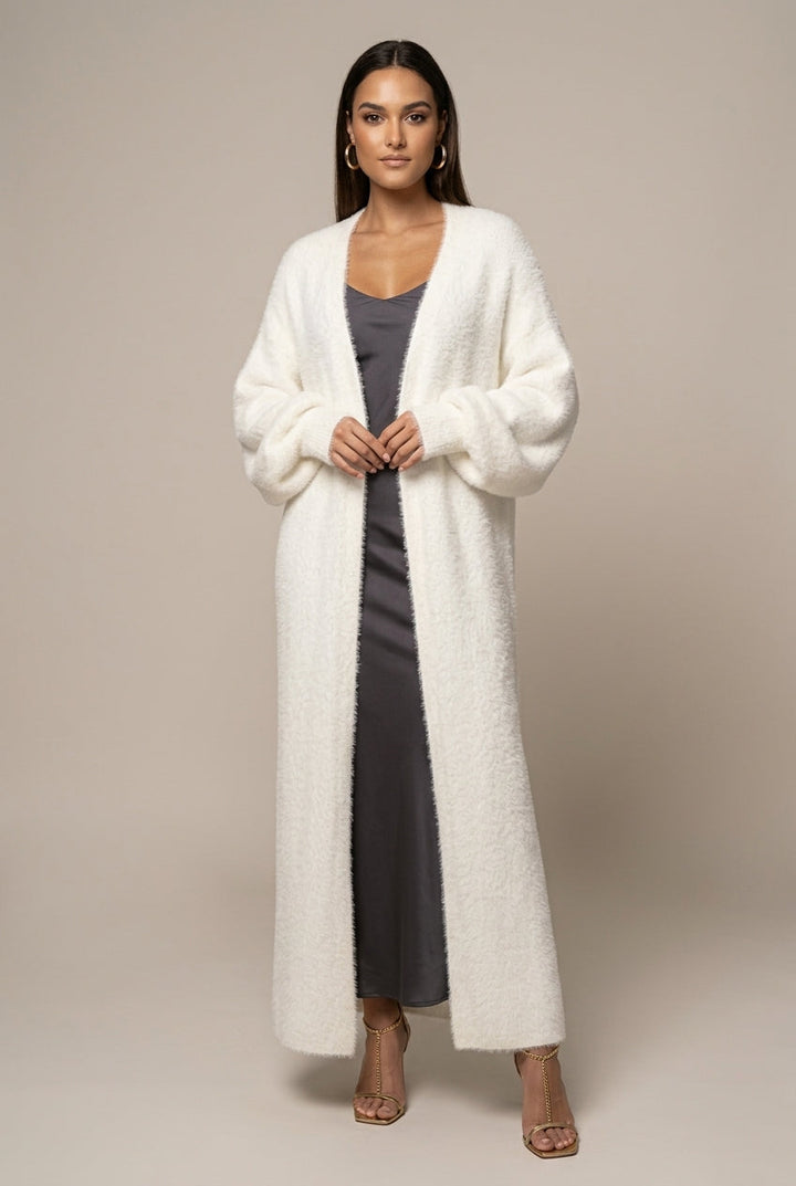 Women's long faux fur cardigan with open front and full-length silhouette