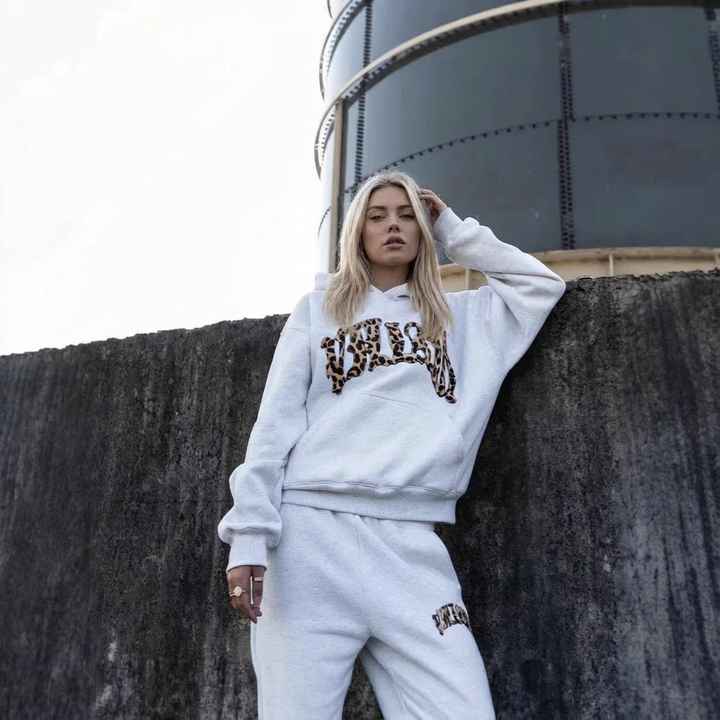 Women's leopard print hoodie and jogger set with hood and long sleeves