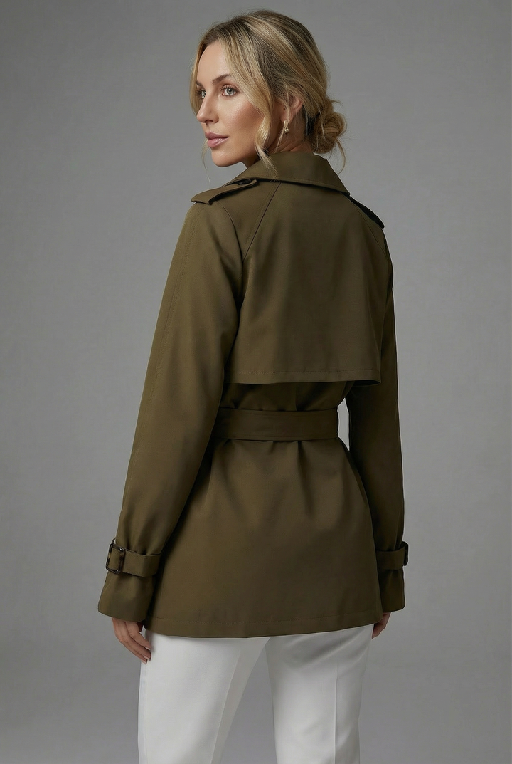 Women's green belted trench coat with notched lapels and long sleeves
