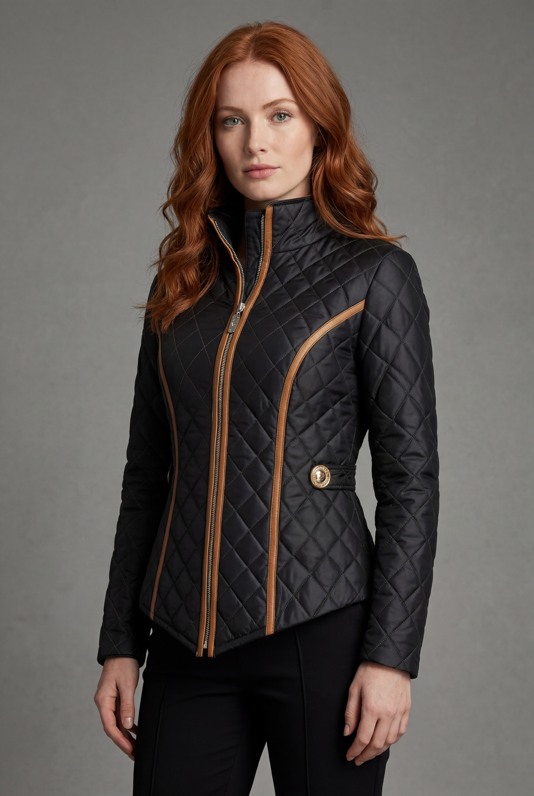 Women's black diamond quilted jacket with tan trim and zip front