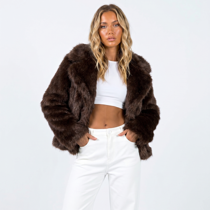 Women's cropped faux fur jacket with long sleeves and open front