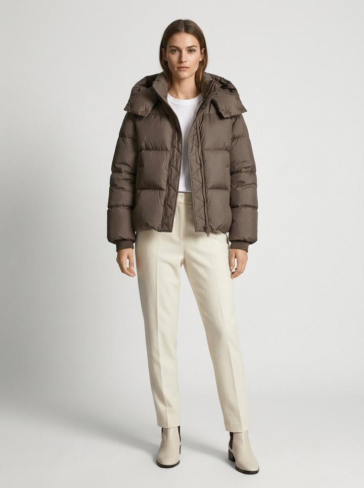 Women's oversized hooded puffer jacket with zip front and drawcord hem
