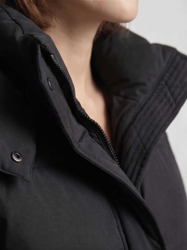 Women's oversized hooded puffer jacket with zip front and drawcord hem