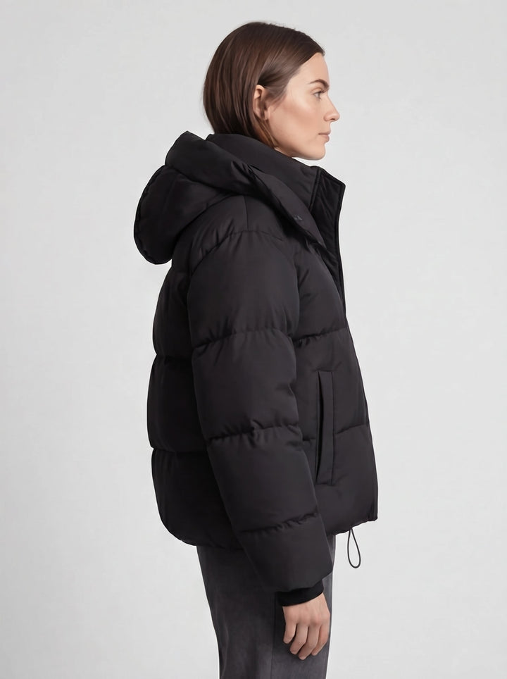 Women's oversized hooded puffer jacket with zip front and drawcord hem