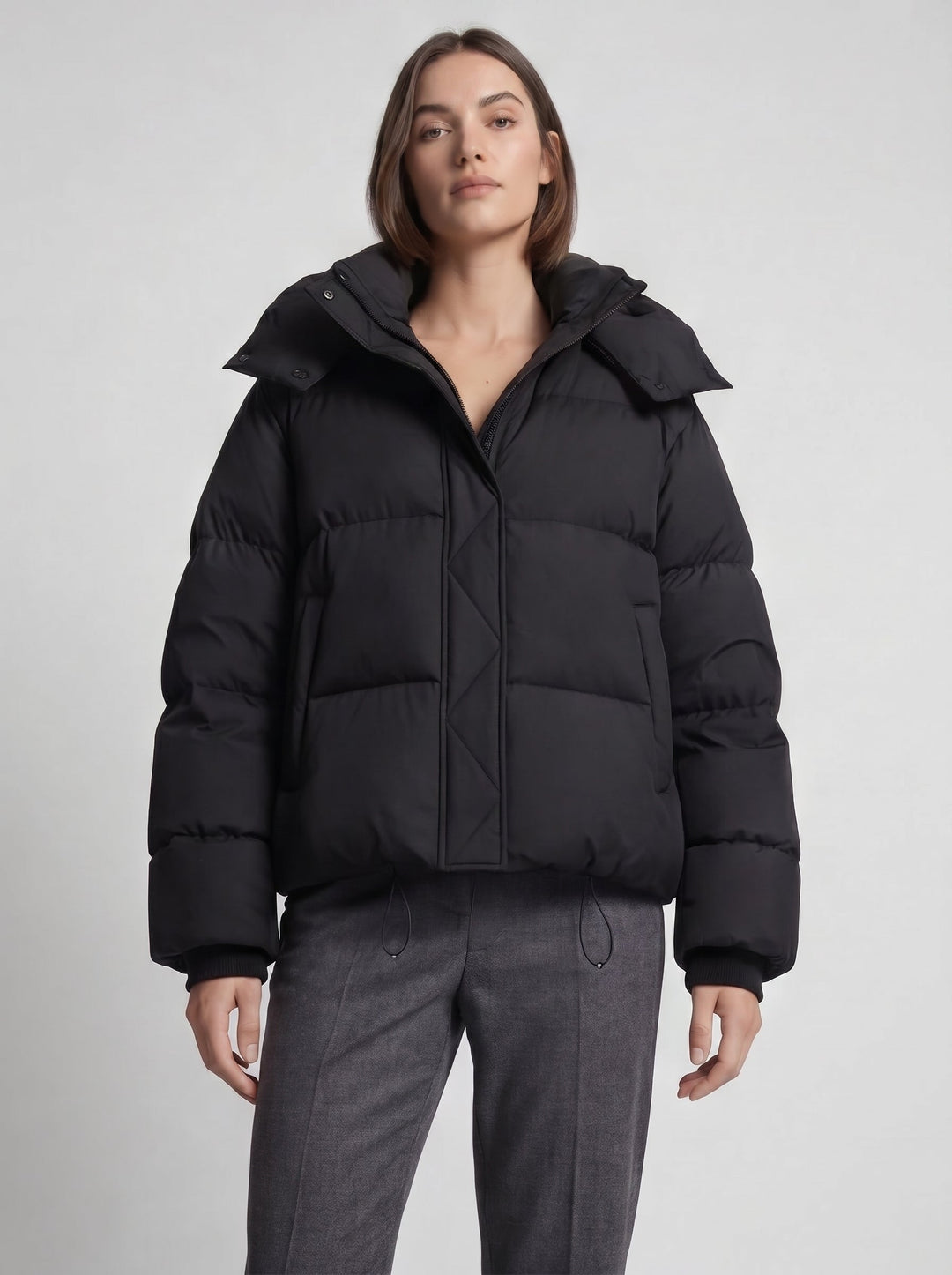 Women's oversized hooded puffer jacket with zip front and drawcord hem