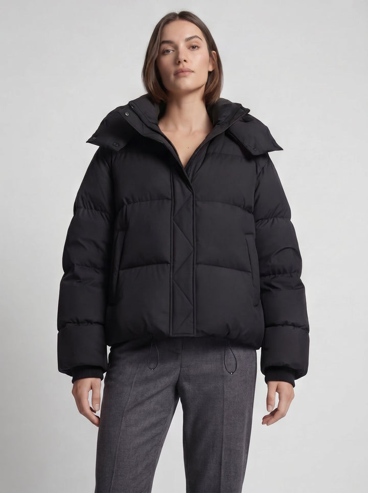 Women's oversized hooded puffer jacket with zip front and drawcord hem
