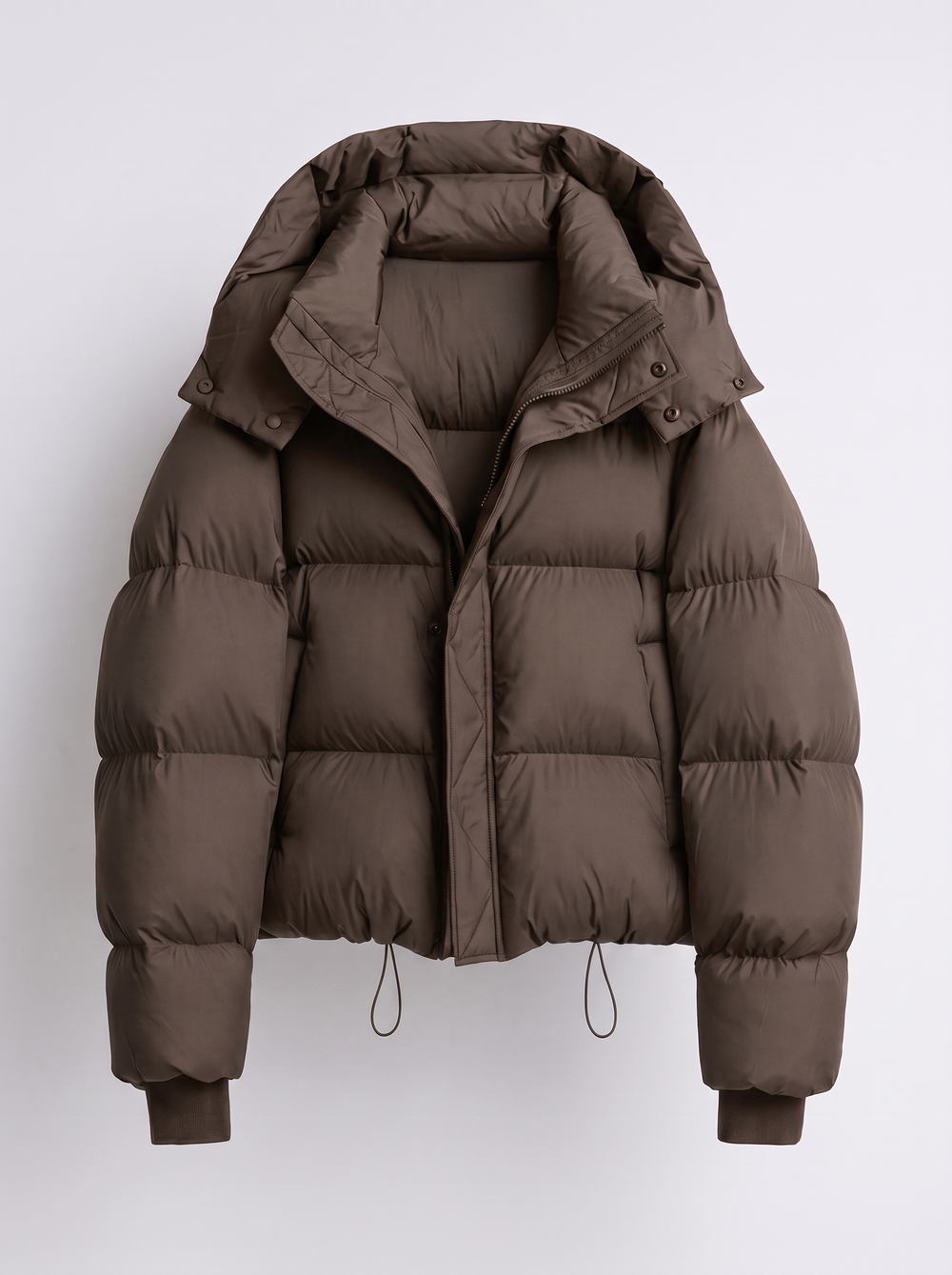 Women's oversized hooded puffer jacket with zip front and drawcord hem