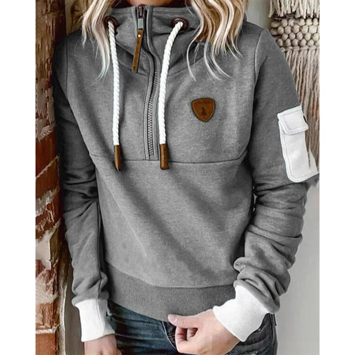 Women's solid zip-up hoodie with drawstring hood and sleeve pocket
