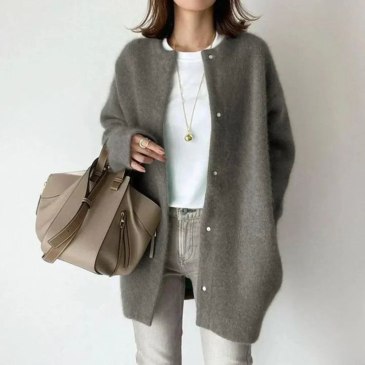 Women's long buttoned knit cardigan jacket with round neckline and long sleeves
