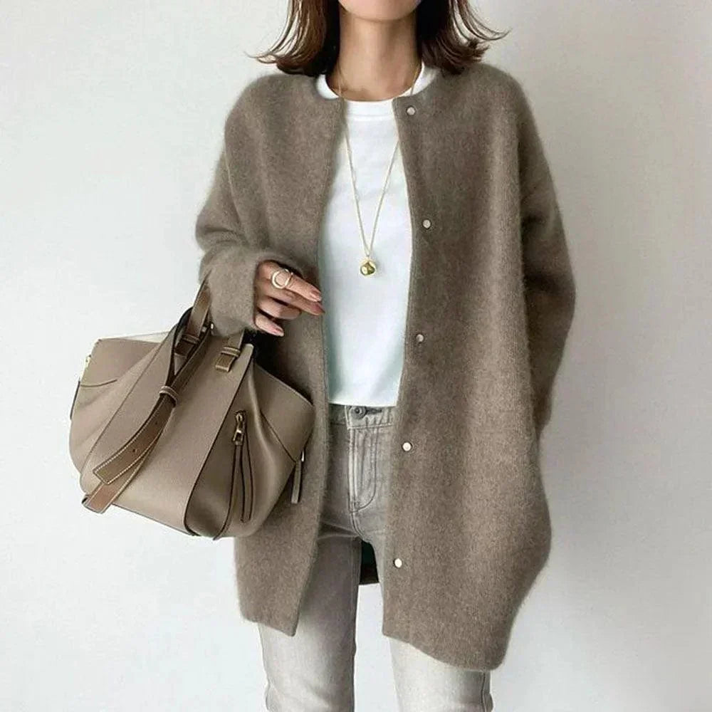 Women's long buttoned knit cardigan jacket with round neckline and long sleeves