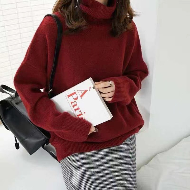 Women's relaxed turtleneck pullover sweater with long sleeves and ribbed trims