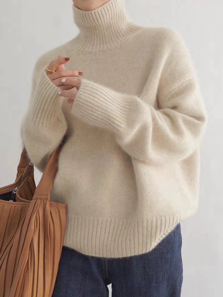 Women's relaxed turtleneck pullover sweater with long sleeves and ribbed trims