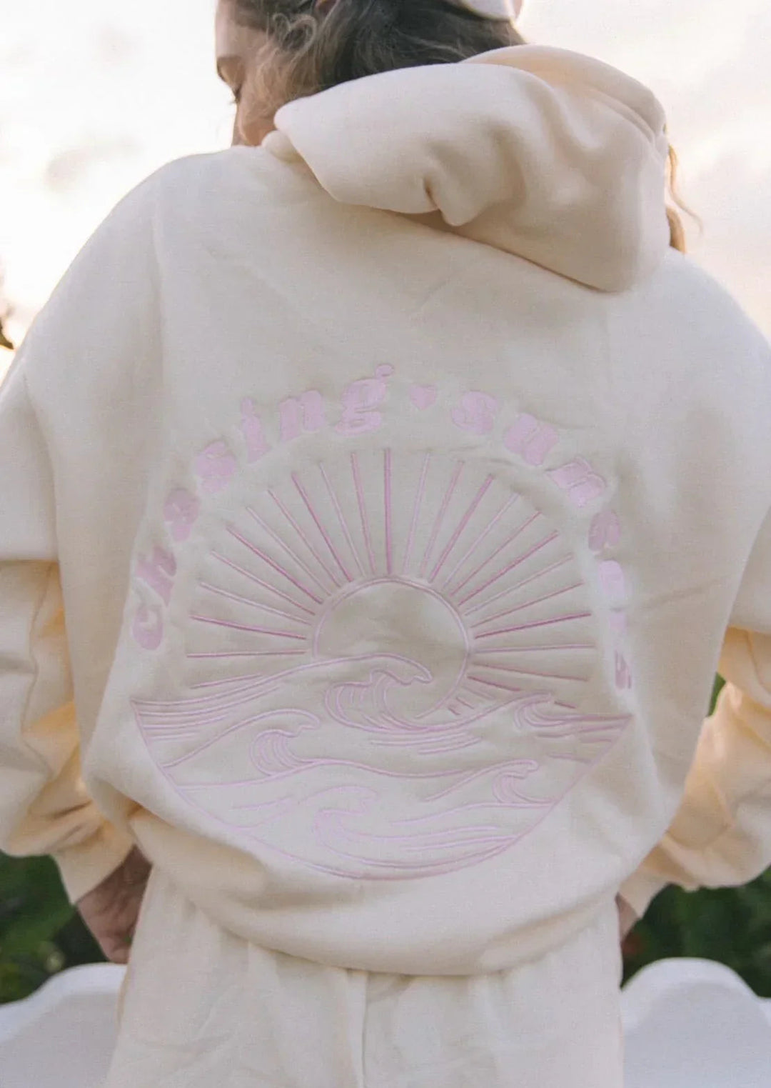 Women's hooded sweatshirt with large illustrated graphic back print and ribbed trims