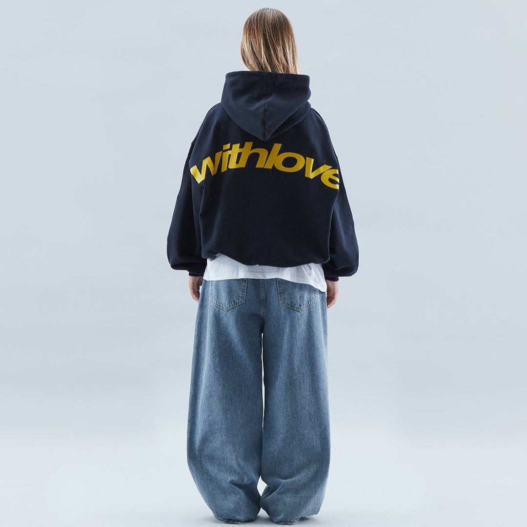 Unisex oversized hooded sweatshirt with contrasting graphic text and long sleeves