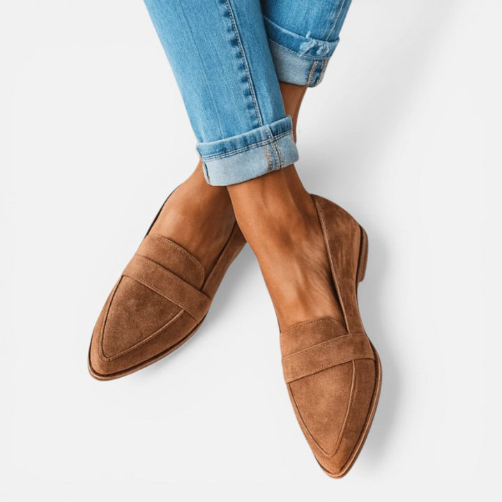 Women's pointed toe loafers with vamp strap detail and low heels