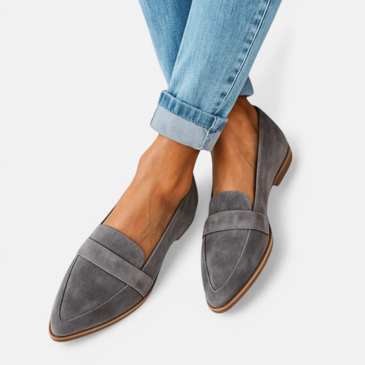 Women's pointed toe loafers with vamp strap detail and low heels