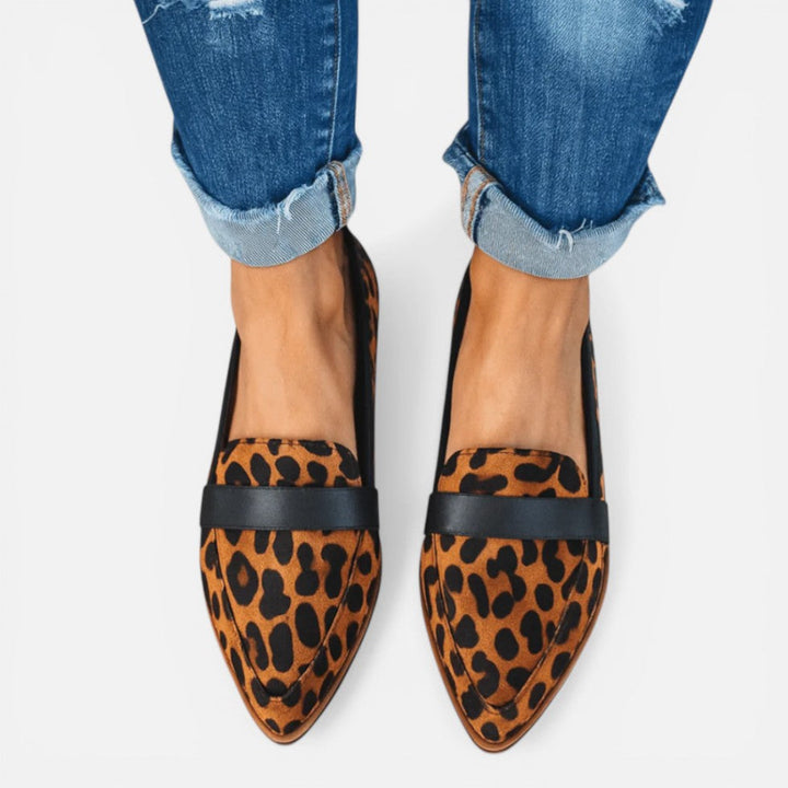 Women's pointed toe loafers with vamp strap detail and low heels