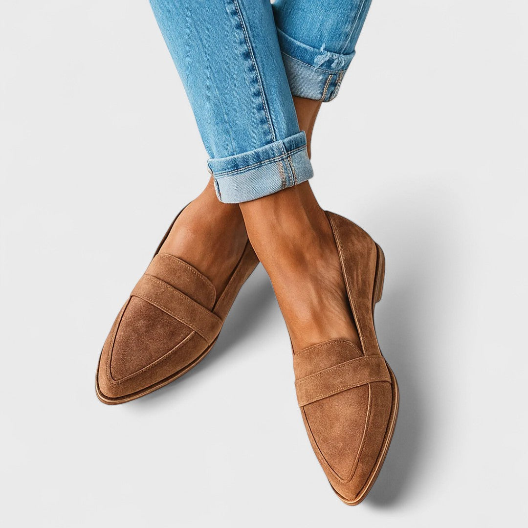 Women's pointed-toe penny loafers with low heels and front strap detail