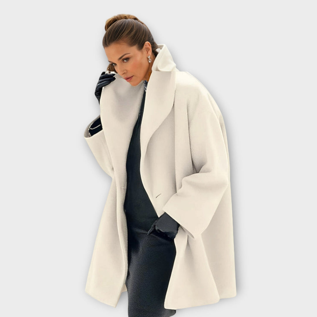 Women's long open front coat with wide lapels and long sleeves