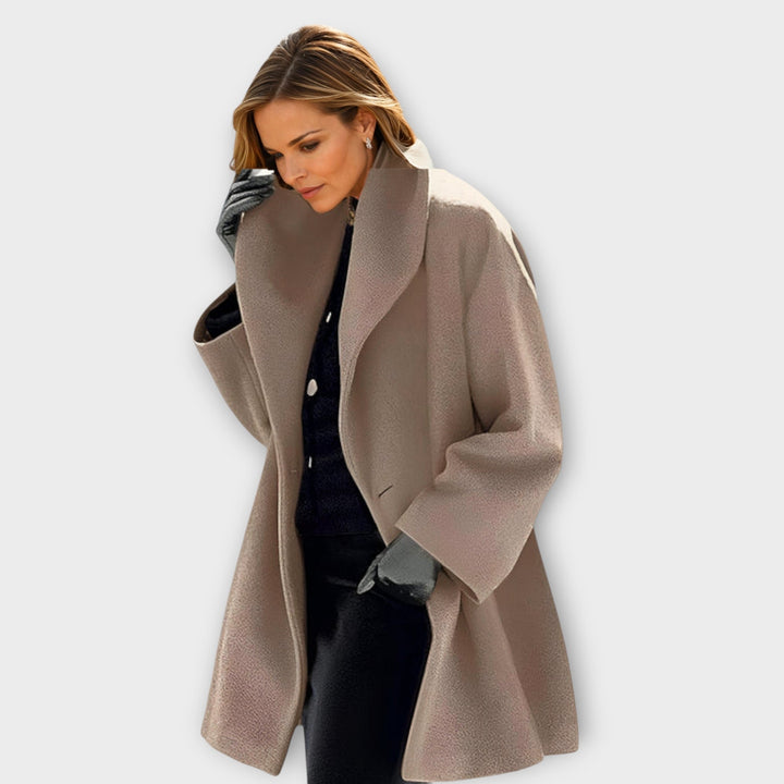 Women's long open front coat with wide lapels and long sleeves