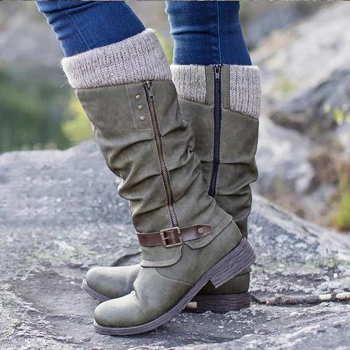 Women's slouch calf boots with knit cuffs, side zippers and buckle straps