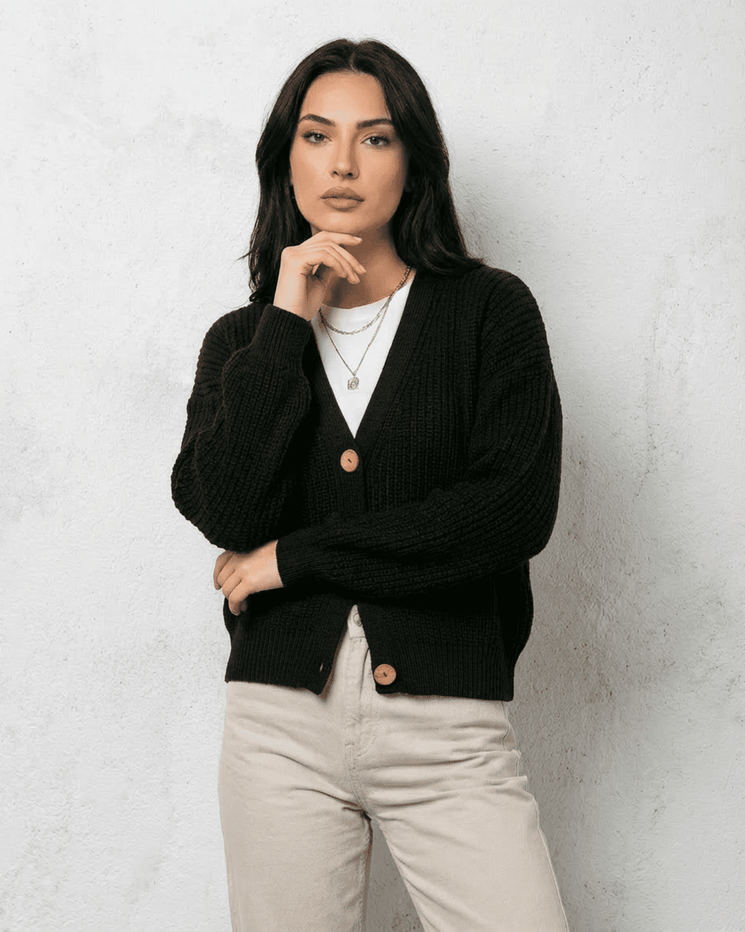 Women's black ribbed cardigan with V-neckline and button front