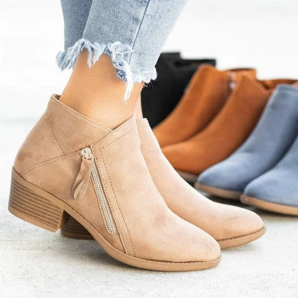 Ankle boots with side zippers, rounded toes and low stacked block heels