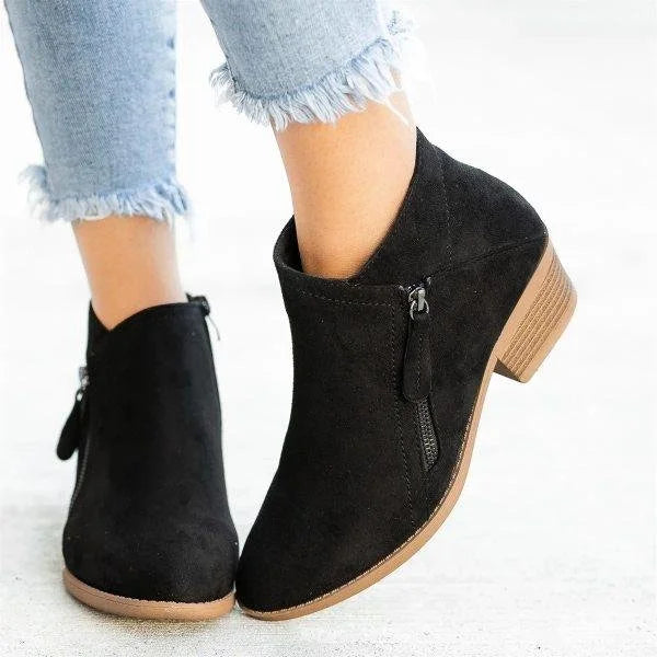 Ankle boots with side zippers, rounded toes and low stacked block heels