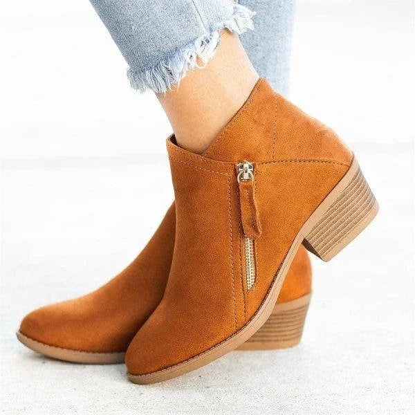 Ankle boots with side zippers, rounded toes and low stacked block heels