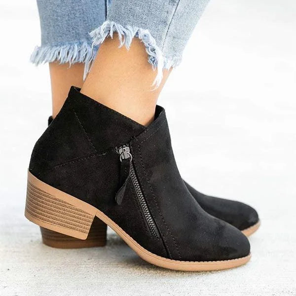 Ankle boots with side zippers, rounded toes and low stacked block heels