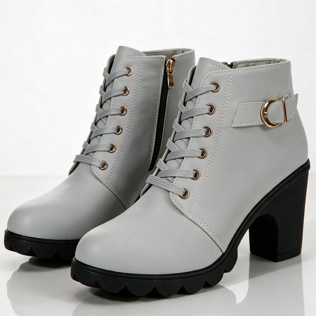 Lace-up ankle boots with buckle straps, side zippers and high block heels