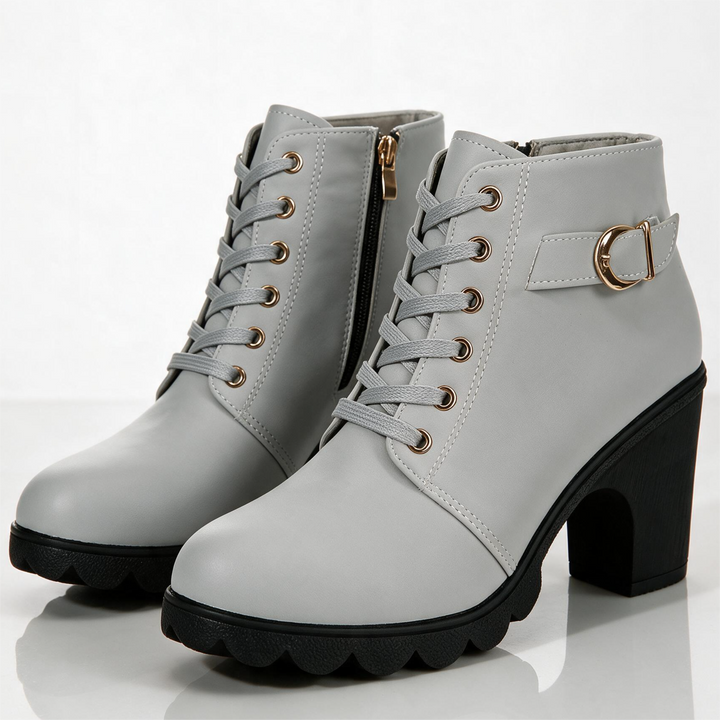 Lace-up ankle boots with buckle straps, side zippers and high block heels