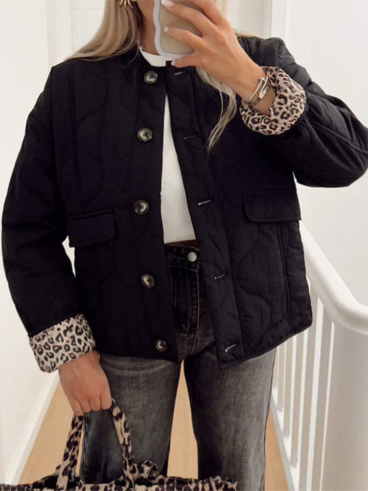 Women's quilted jacket with stand collar, button front and leopard-print cuffs