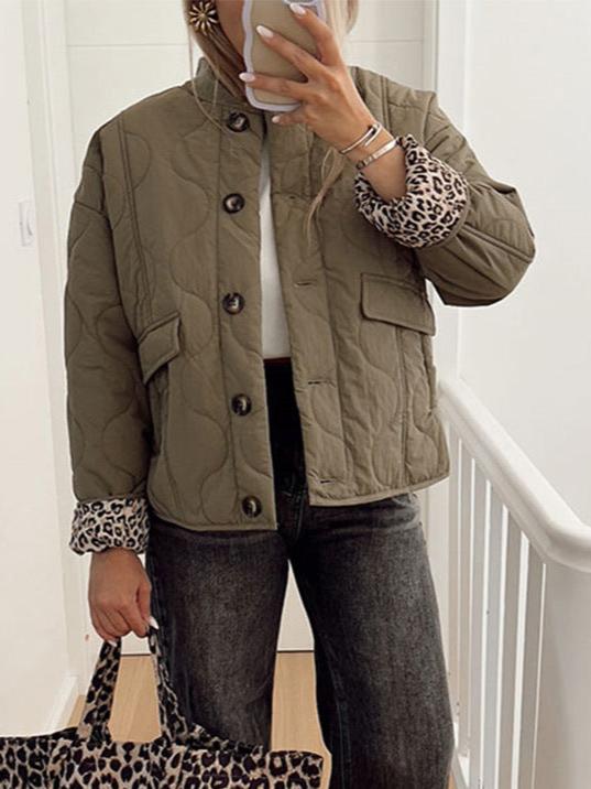 Women's quilted jacket with stand collar, button front and leopard-print cuffs