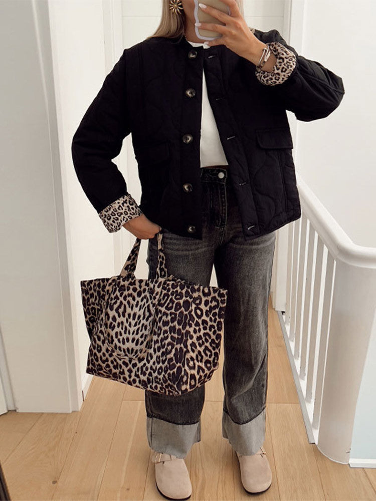 Women's quilted jacket with stand collar, button front and leopard-print cuffs