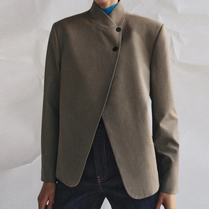 Women's structured blazer with mandarin collar, button front, long sleeves and welt pockets