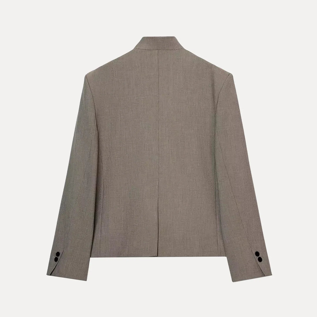 Women's structured blazer with mandarin collar, button front, long sleeves and welt pockets