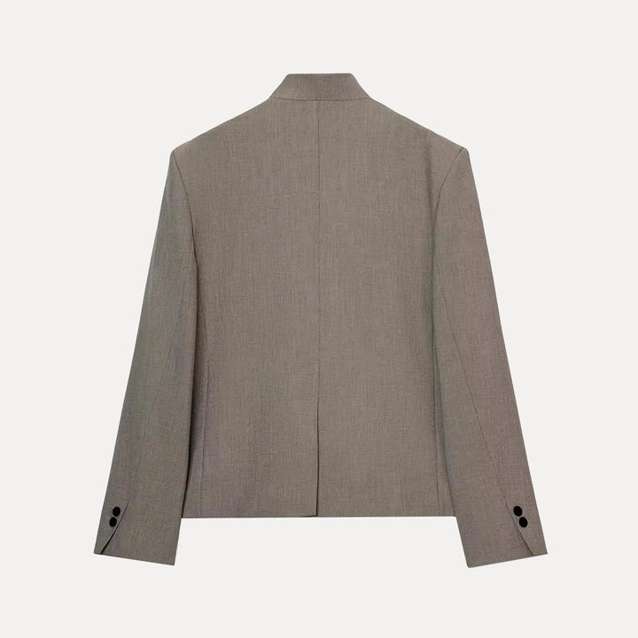 Women's structured blazer with mandarin collar, button front, long sleeves and welt pockets