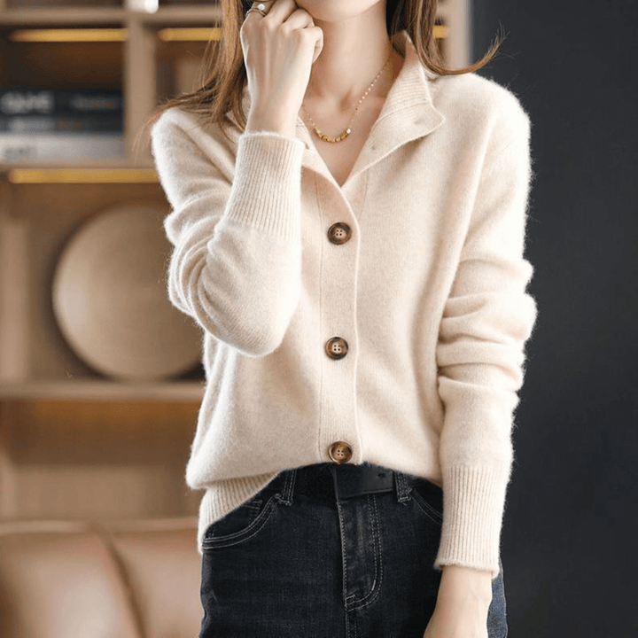 Women's relaxed button front cardigan with long sleeves and ribbed collar
