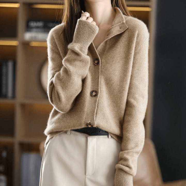 Women's relaxed button front cardigan with long sleeves and ribbed collar