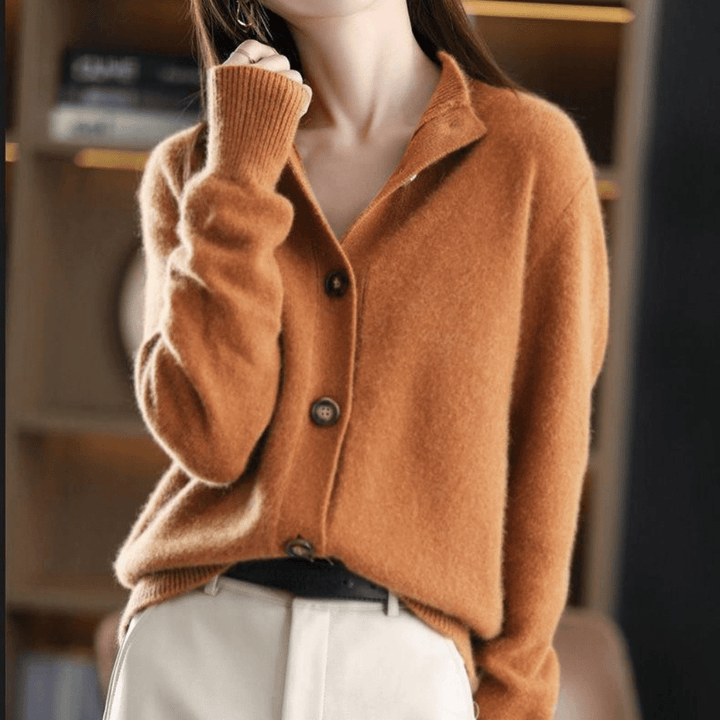 Women's relaxed button front cardigan with long sleeves and ribbed collar