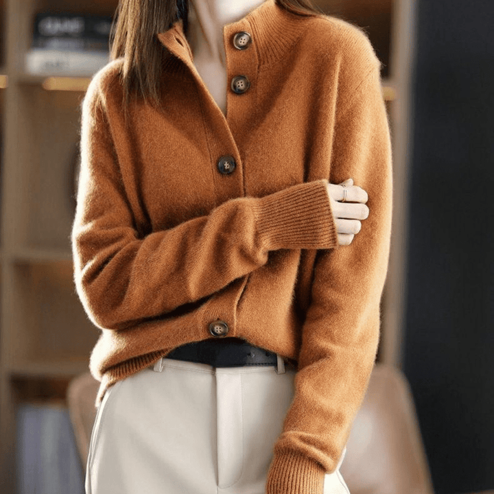 Women's relaxed button front cardigan with long sleeves and ribbed collar