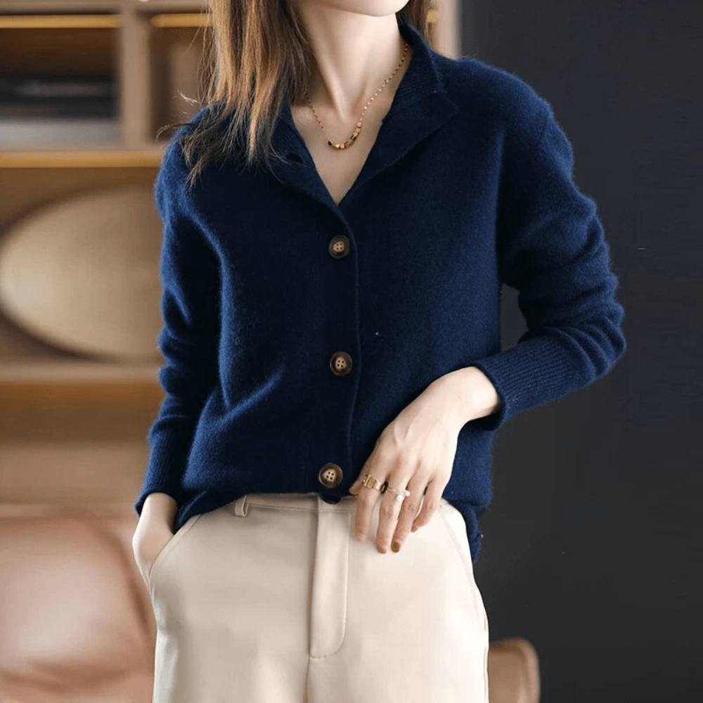 Women's relaxed button front cardigan with long sleeves and ribbed collar