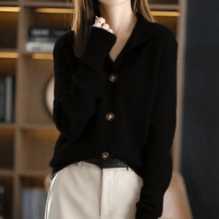 Women's relaxed button front cardigan with long sleeves and ribbed collar